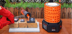 Gloved operator using crucible tongs to pour molten metal into a multi-cavity mold