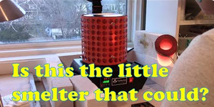 Small ToAuto electric melting furnace operating beside a glowing crucible on a workshop bench